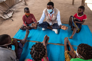  Xavier João, a Save the Children Case Worker, conducts an activity for displaced children in Cabo Delgado, Mozambique.