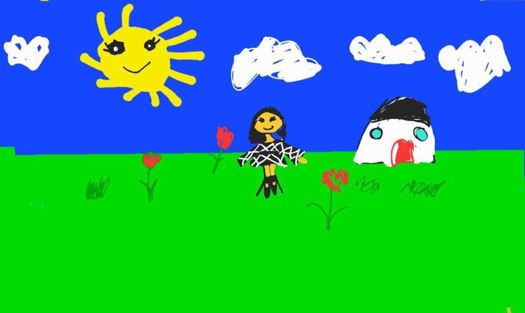 Nana* is the 7 year old daughter os Save the Children staff member Amir. They live in Gaza. Please see quote below from Amir.The picture shows a happy young girl in front of a beautiful green landscape and shining sun.