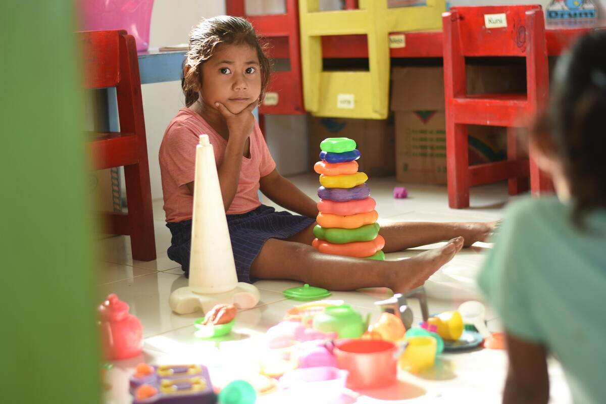 young girl playing at daycare